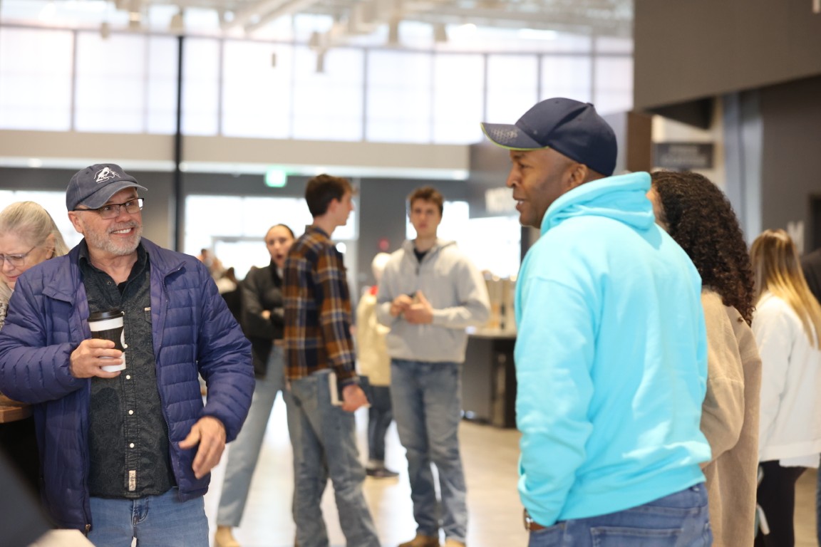 People connecting in the concourse at West Side Christian Church